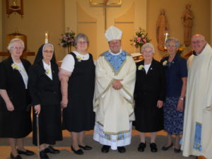 Jubilarians Jubilarians with Bishop Robert and Father Kevin.